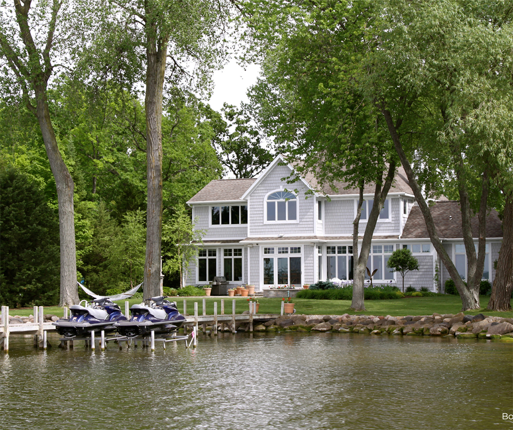 A lake house property with a dock.