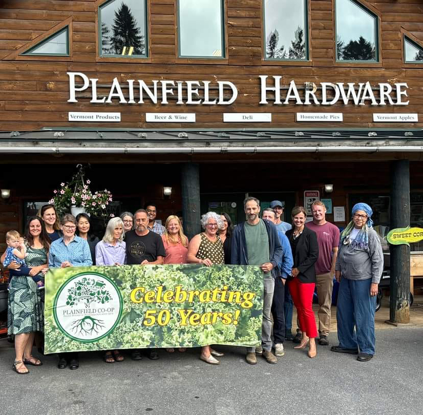 A crowd stands outside the Plainfield Co-Op