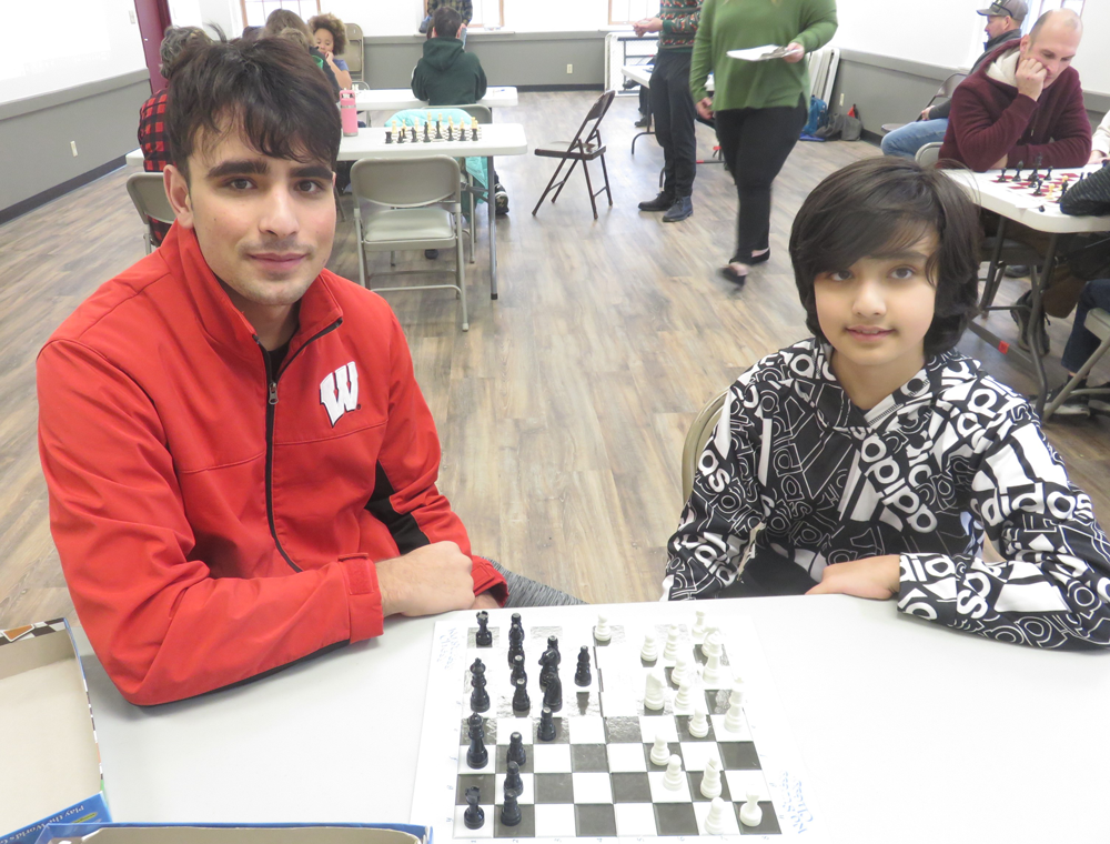 two young people playing chess