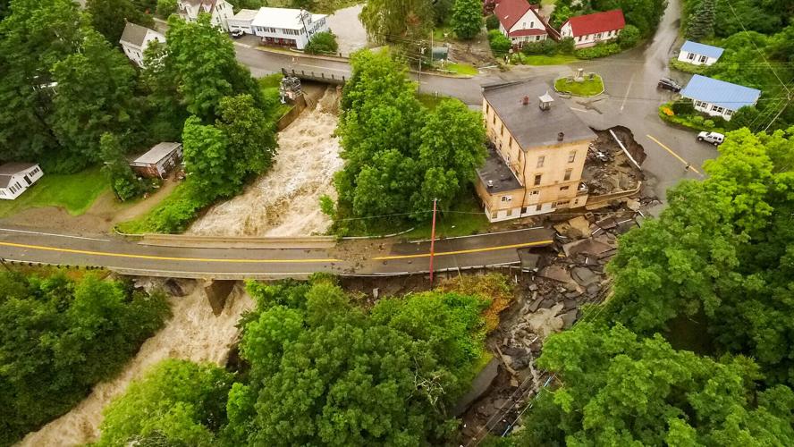 An aerial image of flood damaged roads and buildings in Barnet, VT