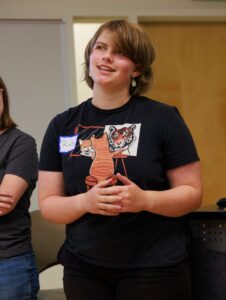 McClure Student standing with hands in front 