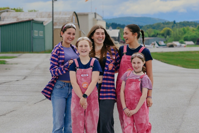 girls smiling together