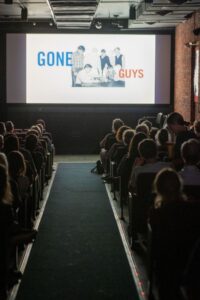 People at a screening of Gone Guys